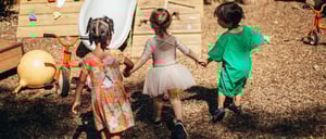 Camp Corlears campers running to the backyard slide