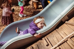 Having fun on the backyard slide