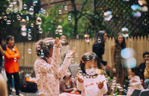 Fun with bubbles in the Corlears backyard with Love Child