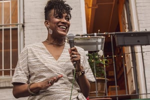 Speaker at backyard party for Corlears 50th birthday