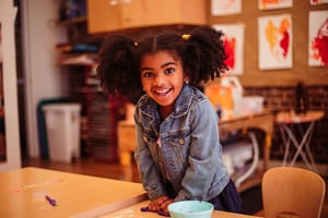 PreK student working on their slime