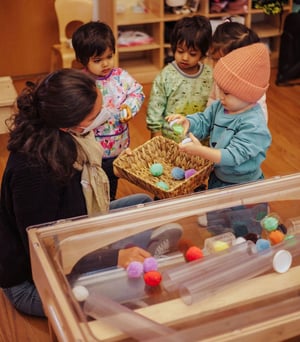 Roots toddler classroom - playing with Ariel