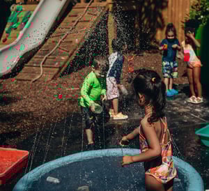 Splash pad fun at Camp Corlears