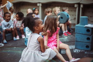 Students having fun at a backyard sing-along