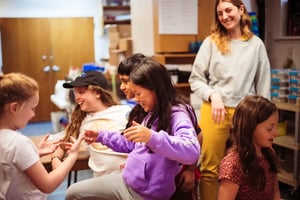 Third graders having fun in art class