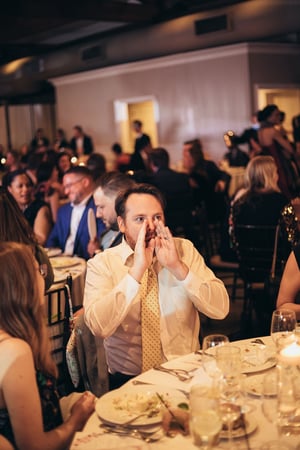 man cheering at corlears gala